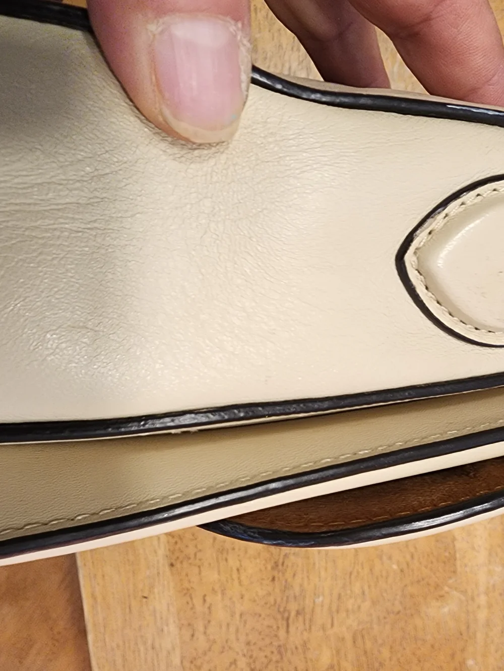 2021 Ivory Coach Beat saddle bag is crafted from glovetanned leather and brass